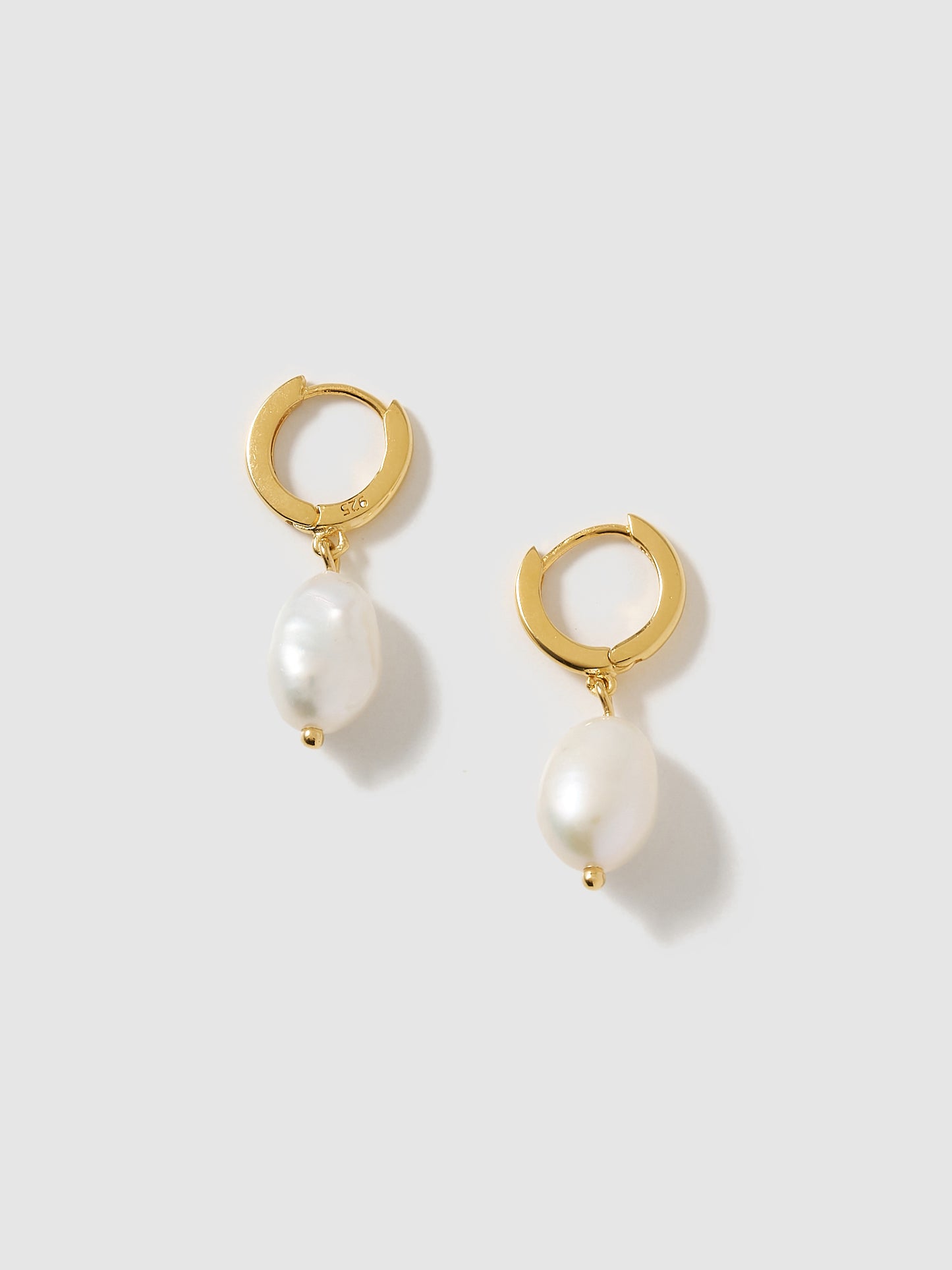 Freshwater pearl gold piercing